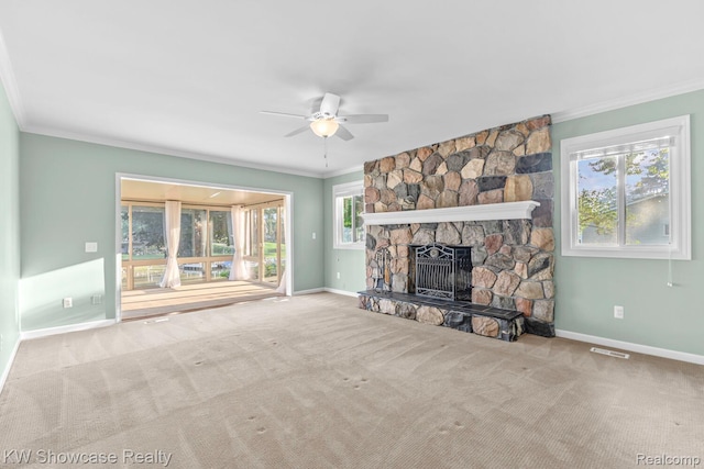 1830 Majon, Highland, MI 48356 - unfurnished living room featuring crown molding, a fireplace, a ceiling fan, and carpet flooring