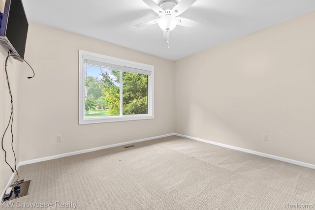 1830 Majon, Highland, MI 48356 - carpeted empty room with baseboards and ceiling fan