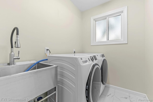 1830 Majon, Highland, MI 48356 - laundry area featuring independent washer and dryer and light marble finish floors