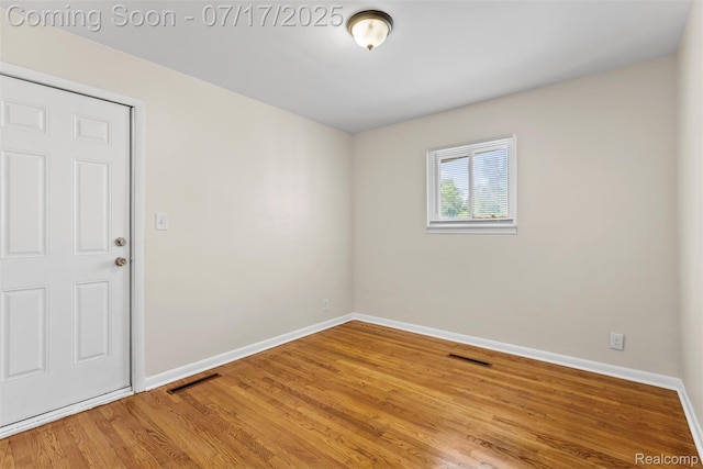 7235 Stout St, Detroit, MI 48228 - unfurnished room with baseboards and light wood-style flooring