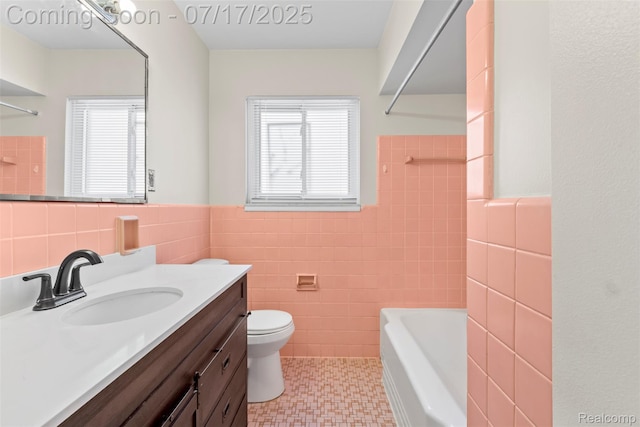 7235 Stout St, Detroit, MI 48228 - bathroom with tile walls, vanity, wainscoting, and shower / bathtub combination