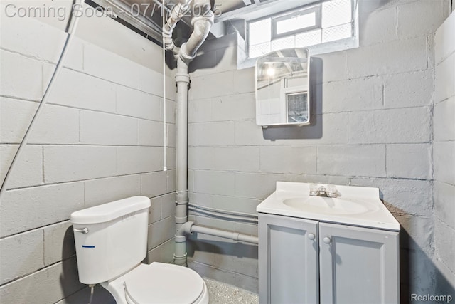 7235 Stout St, Detroit, MI 48228 - half bath featuring vanity and concrete block wall