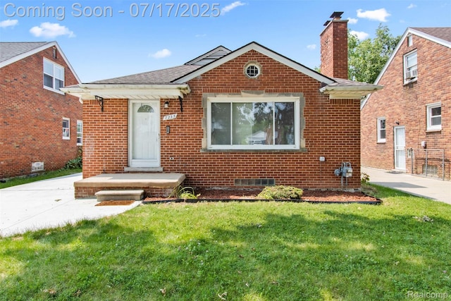 7235 Stout St, Detroit, MI 48228 - bungalow-style home featuring brick siding and a chimney