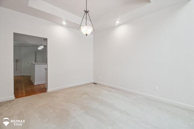 8078 Hawkcrest Dr, Grand Blanc, MI 48439 - empty room with recessed lighting, carpet floors, and a raised ceiling