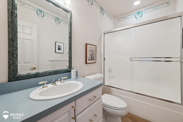 8078 Hawkcrest Dr, Grand Blanc, MI 48439 - bathroom featuring vanity, shower / bath combination with glass door, and recessed lighting