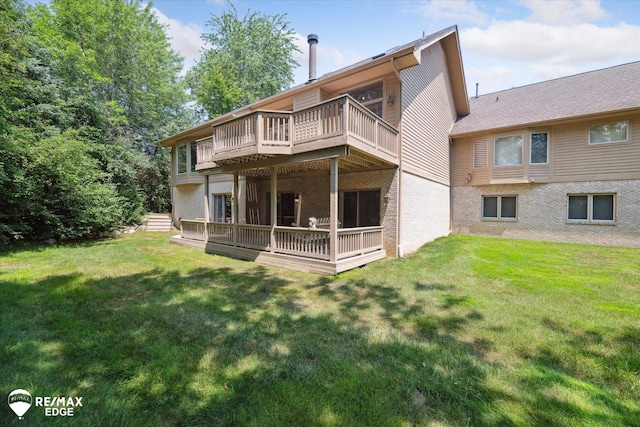 8078 Hawkcrest Dr, Grand Blanc, MI 48439 - back of house with brick siding, a yard, and a wooden deck