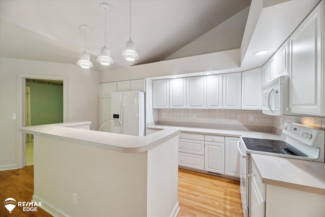 8078 Hawkcrest Dr, Grand Blanc, MI 48439 - kitchen featuring white appliances, backsplash, light wood finished floors, white cabinets, and lofted ceiling