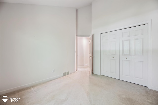 8078 Hawkcrest Dr, Grand Blanc, MI 48439 - unfurnished bedroom featuring carpet and a closet