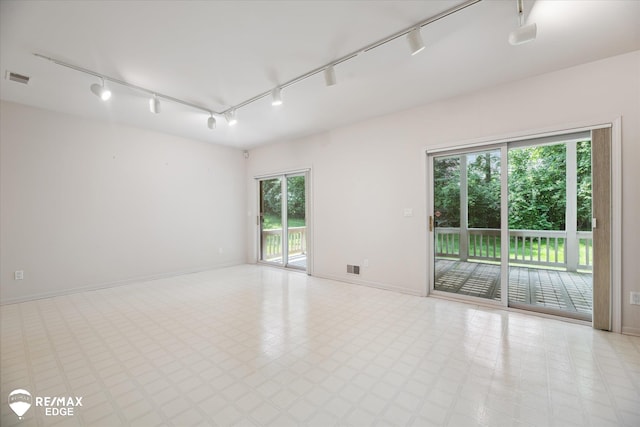 8078 Hawkcrest Dr, Grand Blanc, MI 48439 - spare room featuring track lighting
