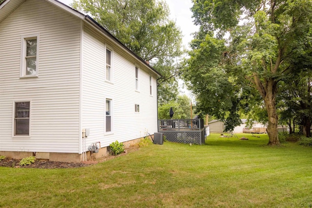 1193 Seneca St, Adrian, MI 49221 - view of side of home with a yard and a deck