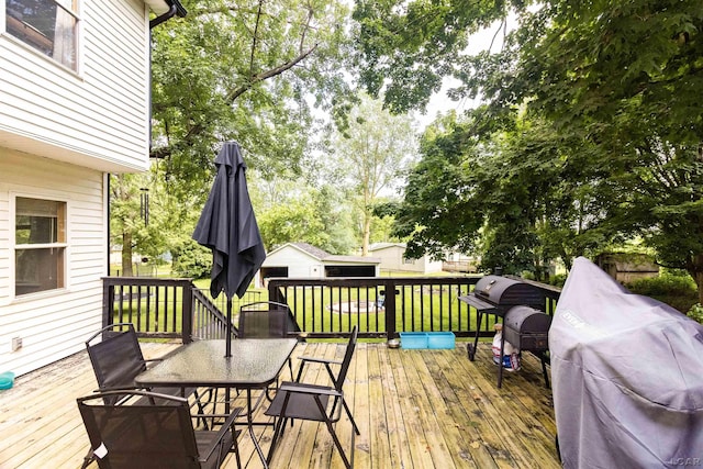 1193 Seneca St, Adrian, MI 49221 - wooden terrace featuring outdoor dining area and area for grilling