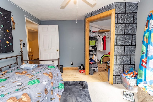 1193 Seneca St, Adrian, MI 49221 - bedroom featuring wood finished floors, a closet, and ceiling fan