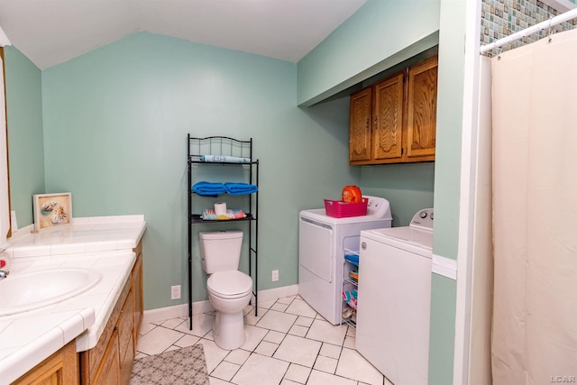 1193 Seneca St, Adrian, MI 49221 - washroom with washer and clothes dryer and light tile patterned flooring