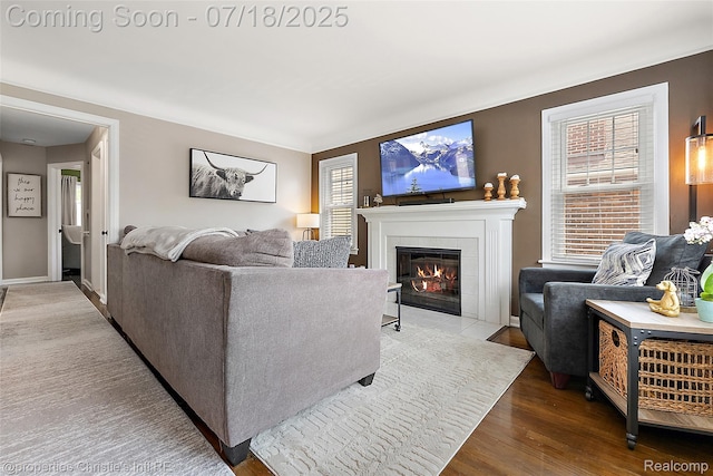 1816 Roslyn Rd, Grosse Pointe Woods, MI 48236 - living area featuring a tiled fireplace and wood finished floors