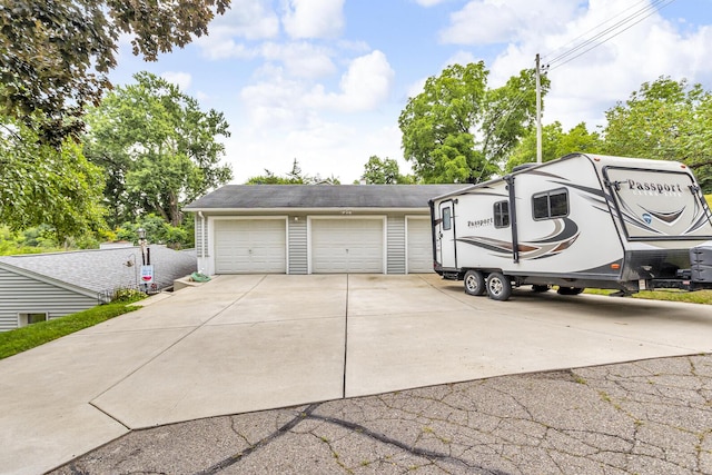 11585 Onsted Hwy, Brooklyn, MI 49230 - garage featuring driveway