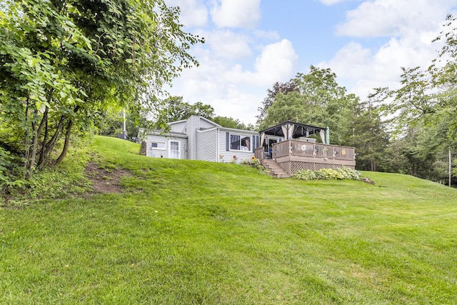 11585 Onsted Hwy, Brooklyn, MI 49230 - view of green lawn featuring a wooden deck and stairs
