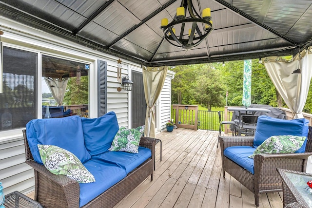11585 Onsted Hwy, Brooklyn, MI 49230 - deck featuring a gazebo, ceiling fan, outdoor dining area, and outdoor lounge area