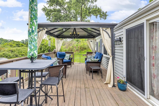 11585 Onsted Hwy, Brooklyn, MI 49230 - wooden terrace featuring a gazebo and an outdoor living space