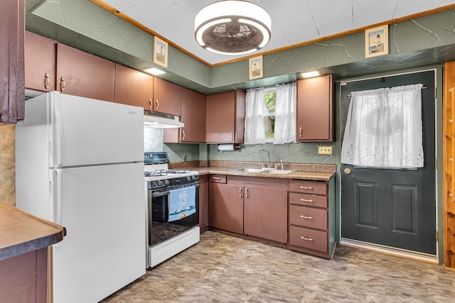 11585 Onsted Hwy, Brooklyn, MI 49230 - kitchen with white appliances and under cabinet range hood