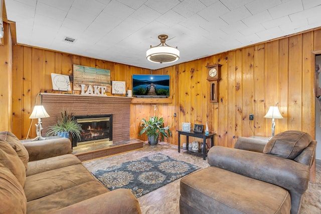 11585 Onsted Hwy, Brooklyn, MI 49230 - living area with a brick fireplace and wood walls