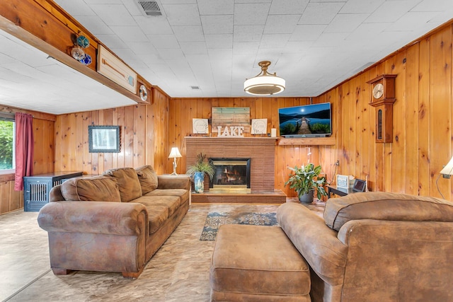 11585 Onsted Hwy, Brooklyn, MI 49230 - living area with wooden walls and a brick fireplace