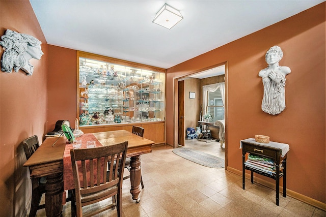 5097 Jackson Rd, Ann Arbor, MI 48103 - dining room featuring light flooring and baseboards