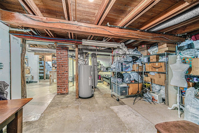 5097 Jackson Rd, Ann Arbor, MI 48103 - unfinished basement featuring water heater