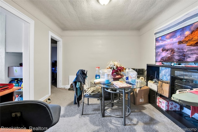 13528 Ardmore St, Detroit, MI 48227 - carpeted dining room featuring a textured ceiling