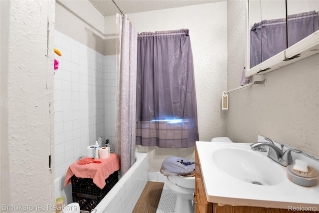 13528 Ardmore St, Detroit, MI 48227 - full bath featuring tiled shower / bath, vanity, and a textured wall