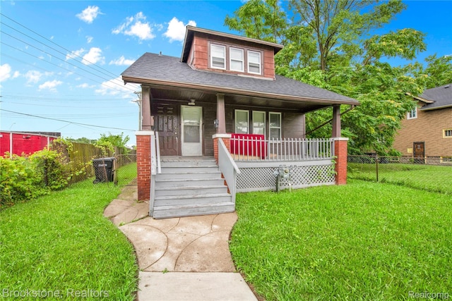 13528 Ardmore St, Detroit, MI 48227 - bungalow with roof with shingles and covered porch