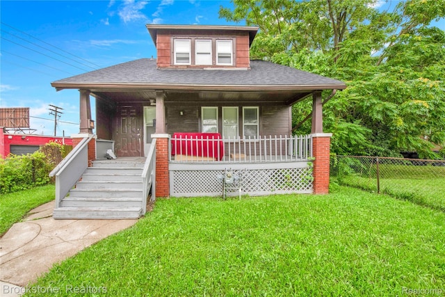 13528 Ardmore St, Detroit, MI 48227 - bungalow with a porch and roof with shingles