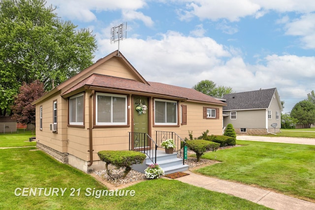 209 3rd St, Linwood, MI 48634 - view of front facade with a front lawn