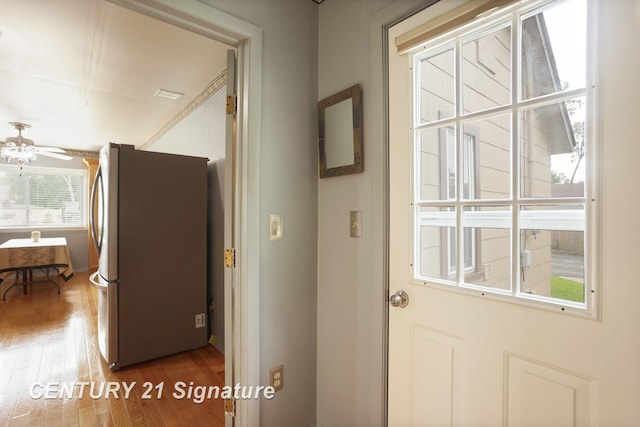 209 3rd St, Linwood, MI 48634 - doorway with wood finished floors and a ceiling fan