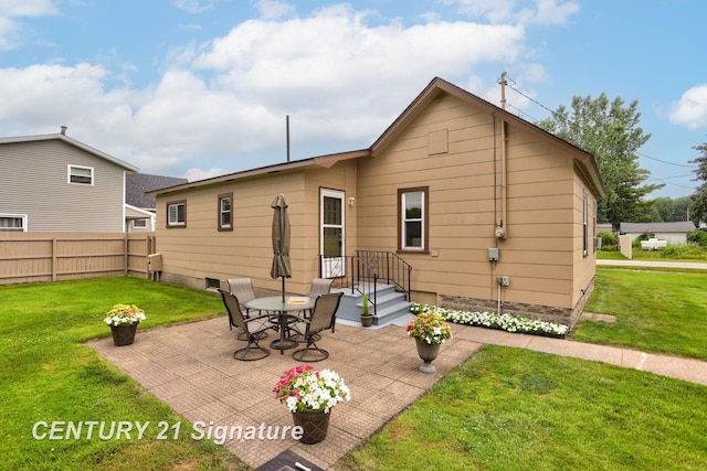 209 3rd St, Linwood, MI 48634 - back of house featuring a patio area