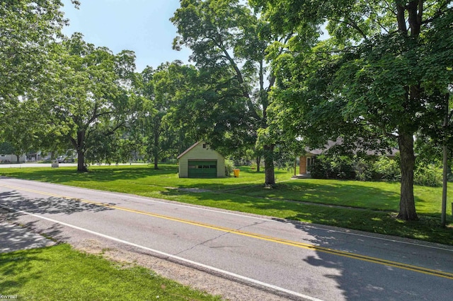 8921 Van Cleve Rd, Vassar, MI 48768 - view of asphalt road featuring view of scattered trees
