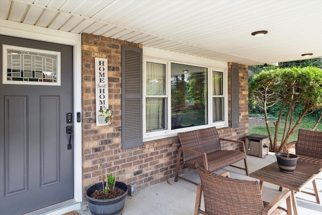 10999 M 140, Niles, MI 49120 - view of exterior entry with brick siding and covered porch