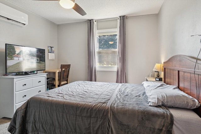 10999 M 140, Niles, MI 49120 - bedroom with a wall unit AC, ceiling fan, and a textured ceiling