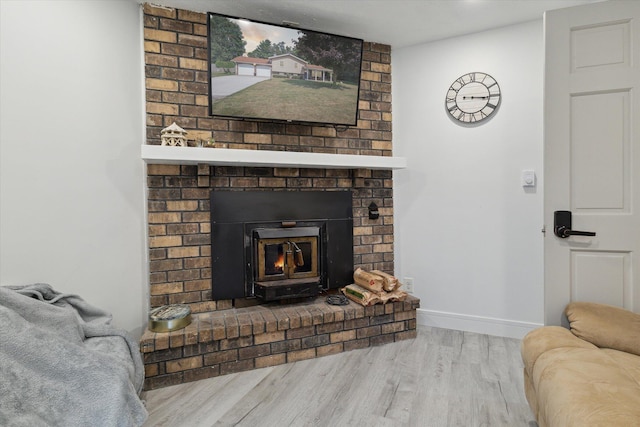 10999 M 140, Niles, MI 49120 - living area featuring wood finished floors and a brick fireplace