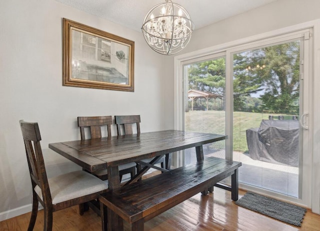 10999 M 140, Niles, MI 49120 - dining area with a chandelier and wood finished floors