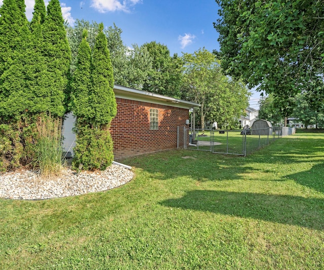 700 Devonshire Rd, Fowlerville, MI 48836 - view of yard with a gate