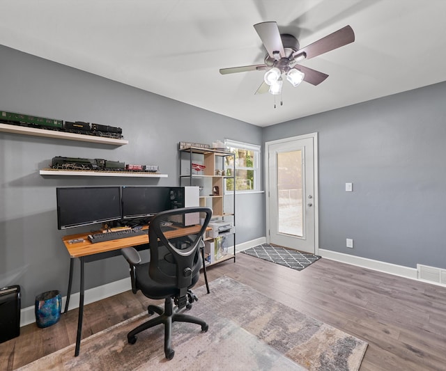 700 Devonshire Rd, Fowlerville, MI 48836 - office area featuring ceiling fan and wood finished floors