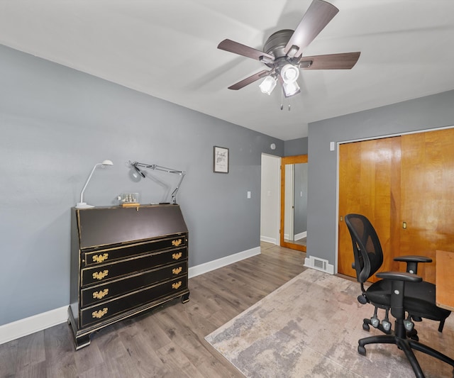 700 Devonshire Rd, Fowlerville, MI 48836 - office space featuring ceiling fan and wood finished floors