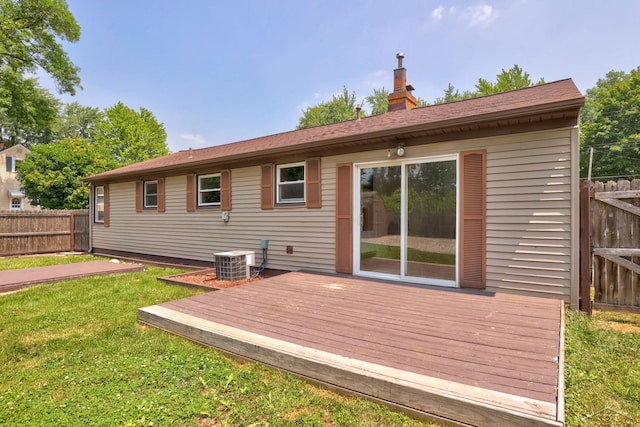 2113 Bock Rd, Saginaw, MI 48603 - back of property featuring a deck and a chimney