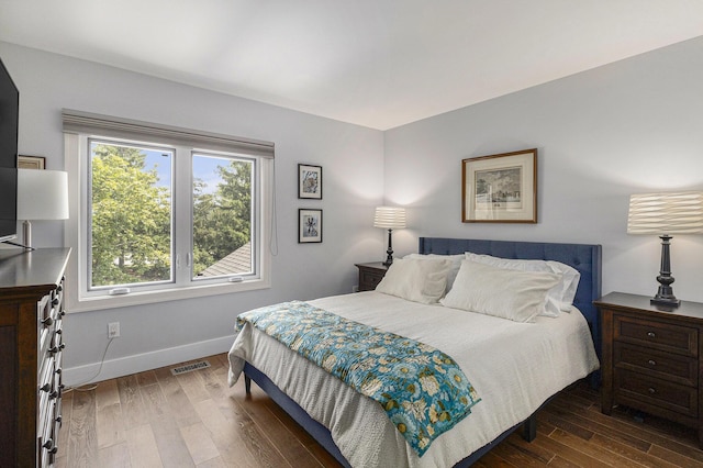 113 Ponds View Dr, Ann Arbor, MI 48103 - bedroom with wood finished floors and baseboards