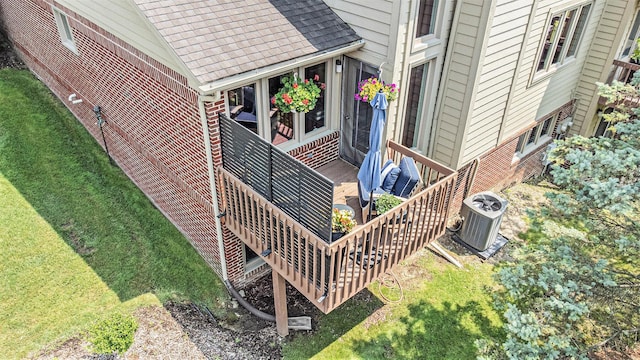 113 Ponds View Dr, Ann Arbor, MI 48103 - view of home's exterior featuring stairway, brick siding, a yard, and roof with shingles