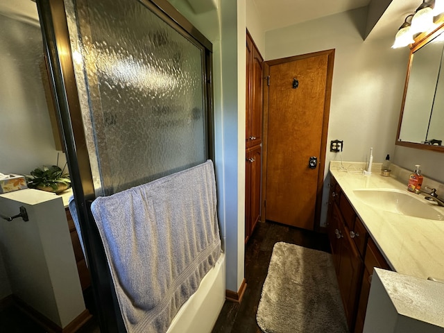 937 Alles Dr SW, Byron Center, MI 49315 - full bath featuring vanity, wood finished floors, and an enclosed shower