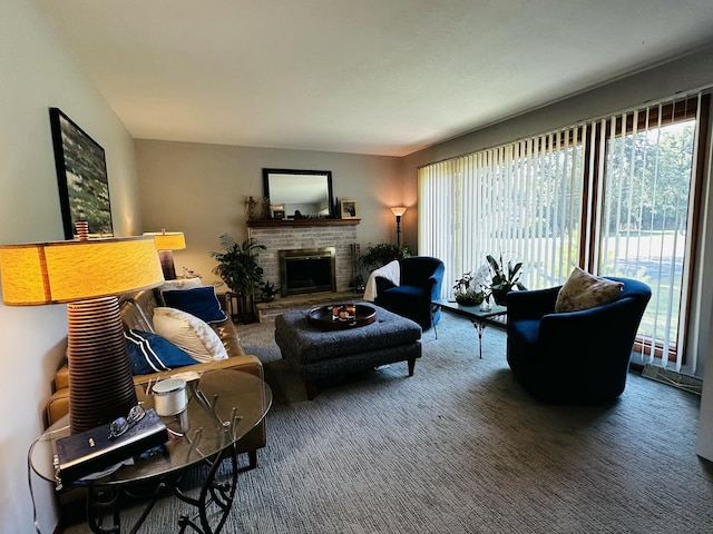 937 Alles Dr SW, Byron Center, MI 49315 - living area with healthy amount of natural light, a brick fireplace, and carpet flooring