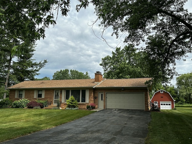 937 Alles Dr SW, Byron Center, MI 49315 - ranch-style home featuring brick siding, driveway, a front lawn, and a garage