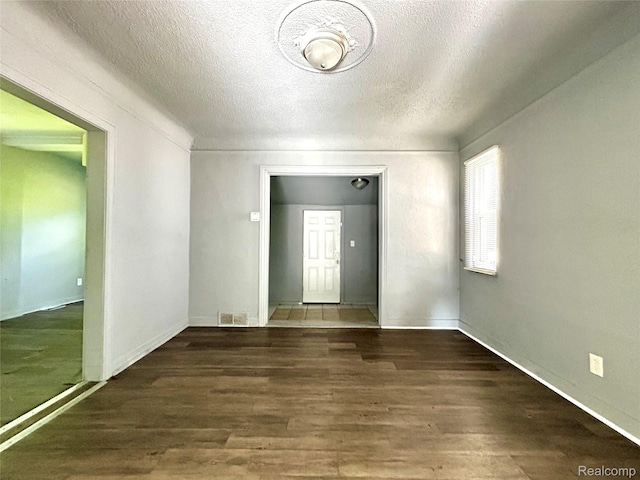 14869 Mark Twain St, Detroit, MI 48227 - unfurnished room featuring a textured ceiling and wood finished floors