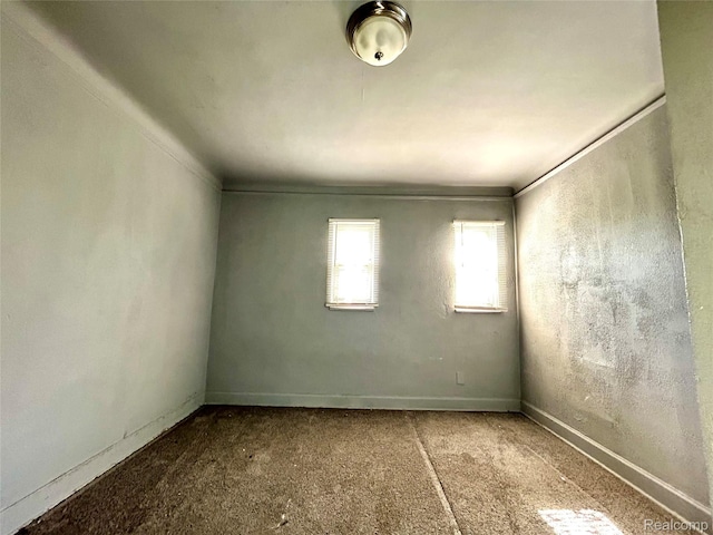 14869 Mark Twain St, Detroit, MI 48227 - unfurnished room with ornamental molding and carpet floors